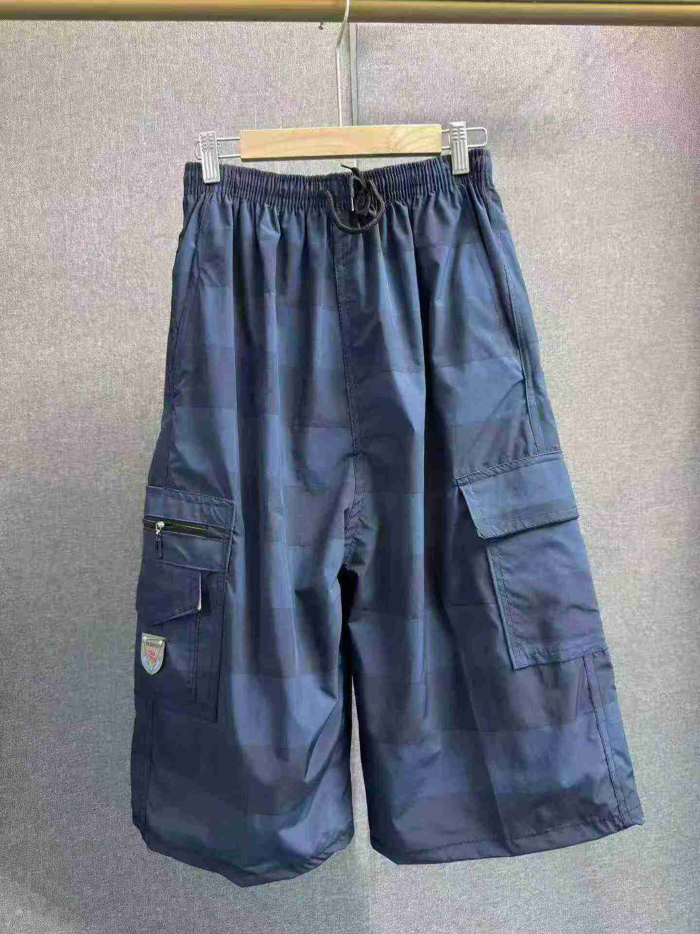 Environ 8880 pièces de pantalons de travail décontractés d'été pour hommes, amples en coton, multipoches et de longueur coupée au-dessus de la cheville - Image 6