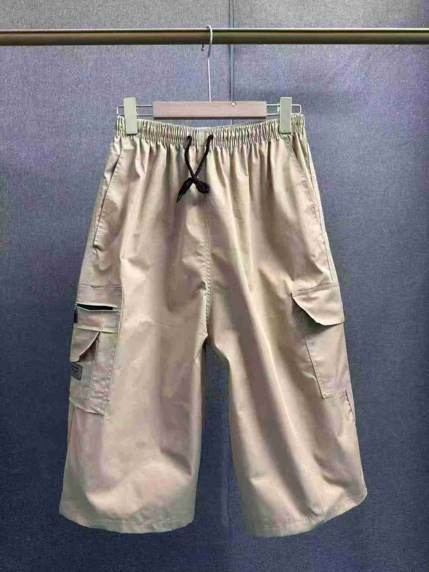 Environ 8880 pièces de pantalons de travail décontractés d'été pour hommes, amples en coton, multipoches et de longueur coupée au-dessus de la cheville - Image 8