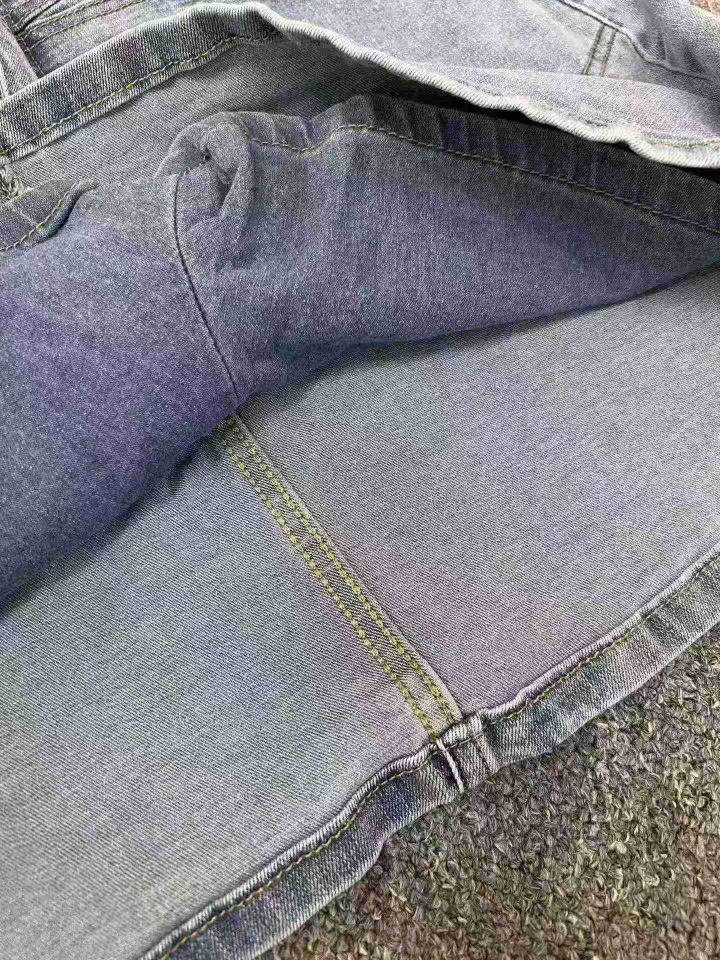 325 pièces de jupes en jean coupe A rétro slim à taille haute à haute élasticité - Image 9