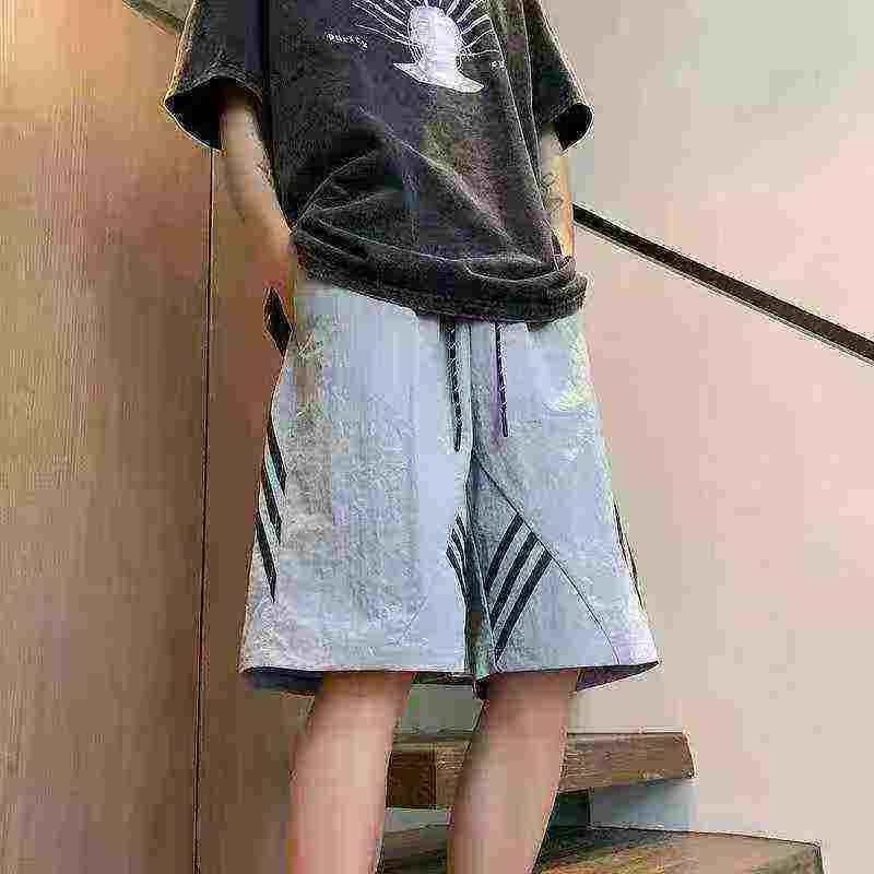 740 pièces Shorts de sport décontractés pour hommes de haute qualité, tendance américaine, en soie glacée à séchage rapide - Image 3