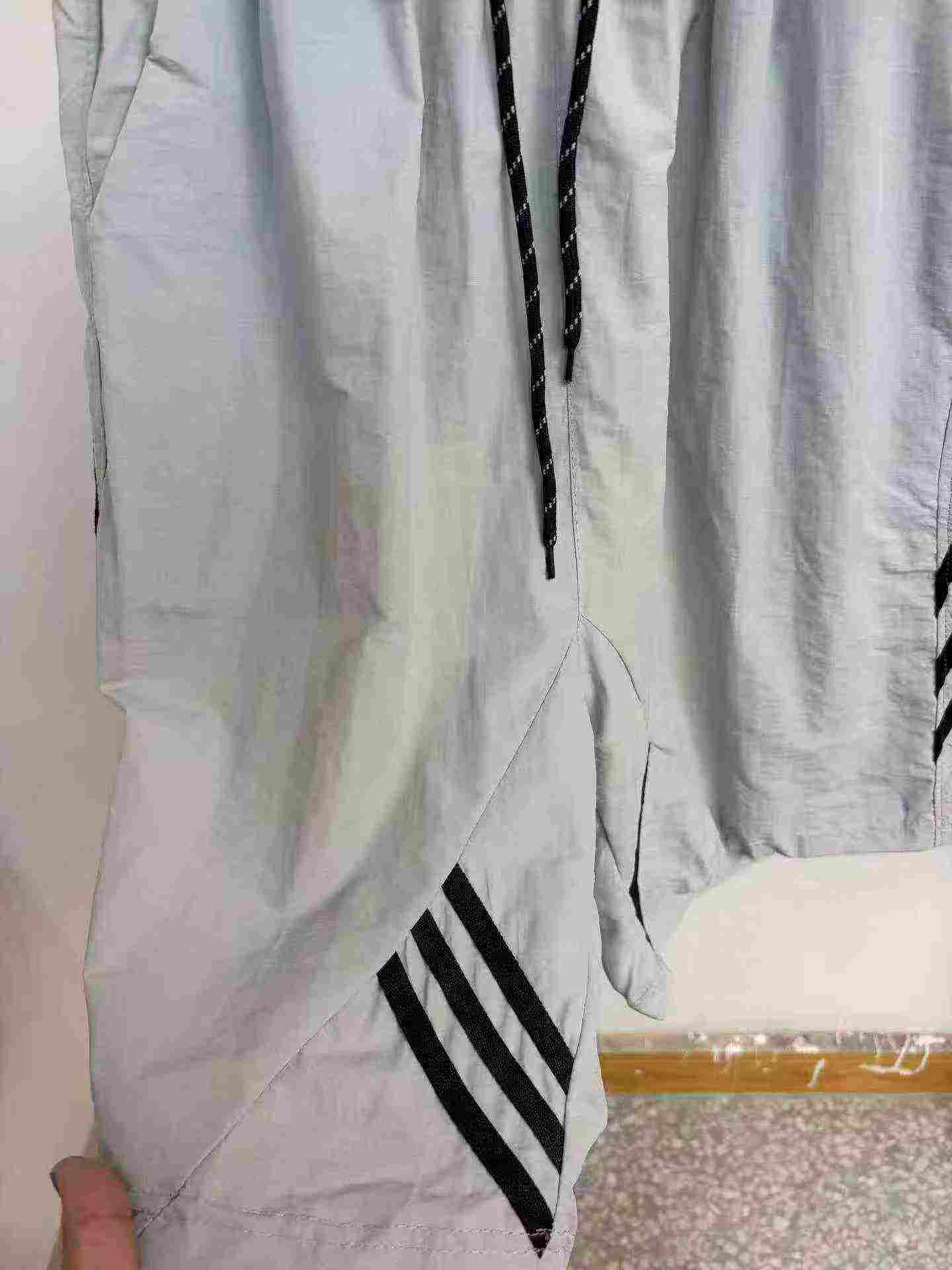 740 pièces Shorts de sport décontractés pour hommes de haute qualité, tendance américaine, en soie glacée à séchage rapide - Image 7