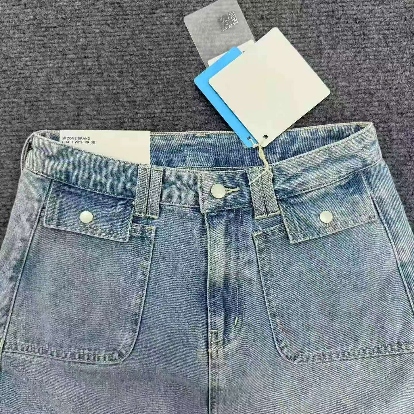Damska jasnoniebieska wysokopasowa wyprana dżinsowa spódnica mini w linii A, około 350 sztuk z metkami, rozmiary S-2XL - Image 5