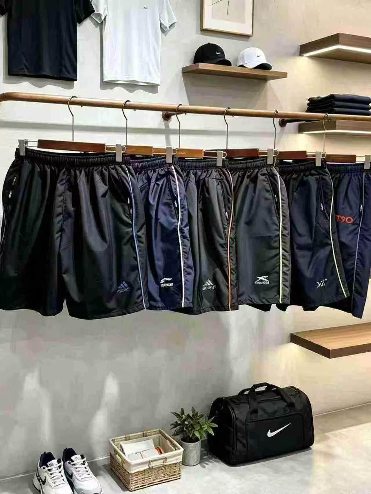 9999 Pcs Men's Quick Dry Loose Summer Beach Five-point Shorts One Size Individually Packed - Image 2
