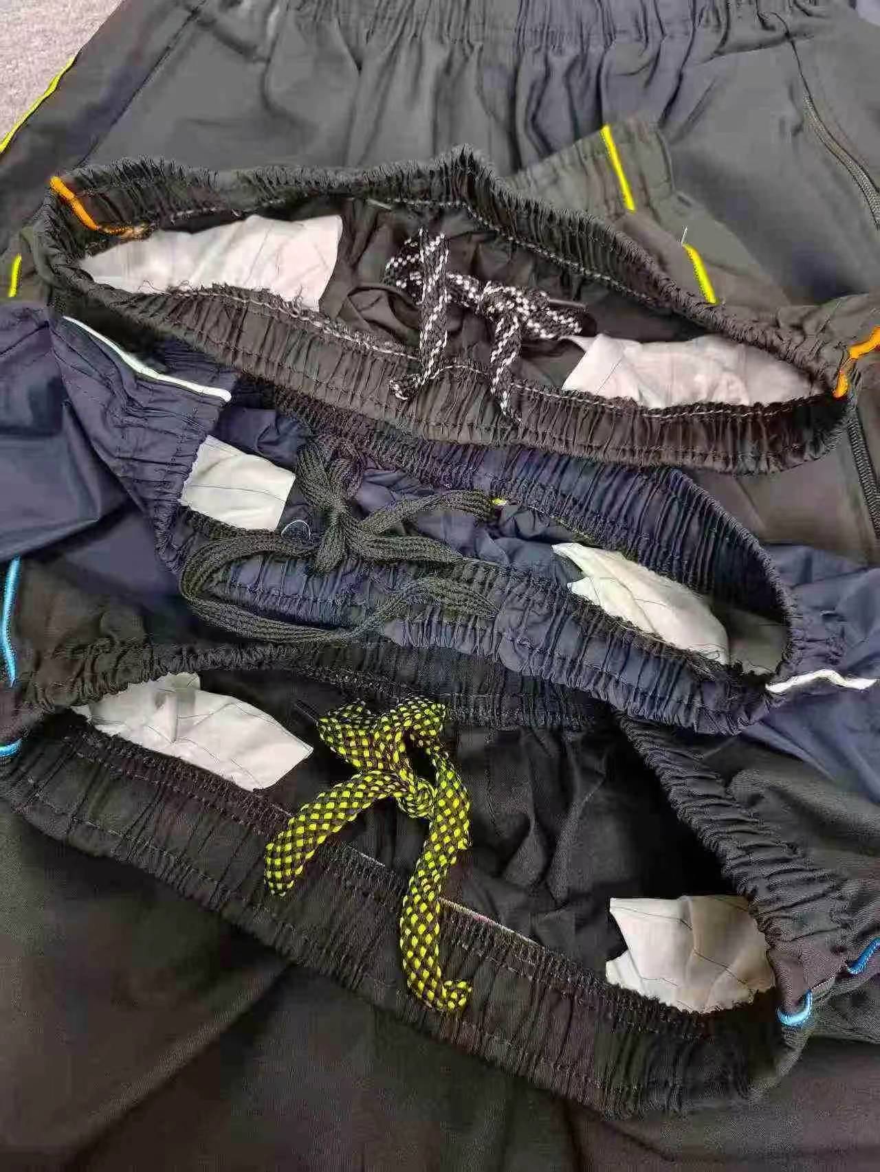 9999 Pcs Men's Quick Dry Loose Summer Beach Five-point Shorts One Size Individually Packed - Image 3