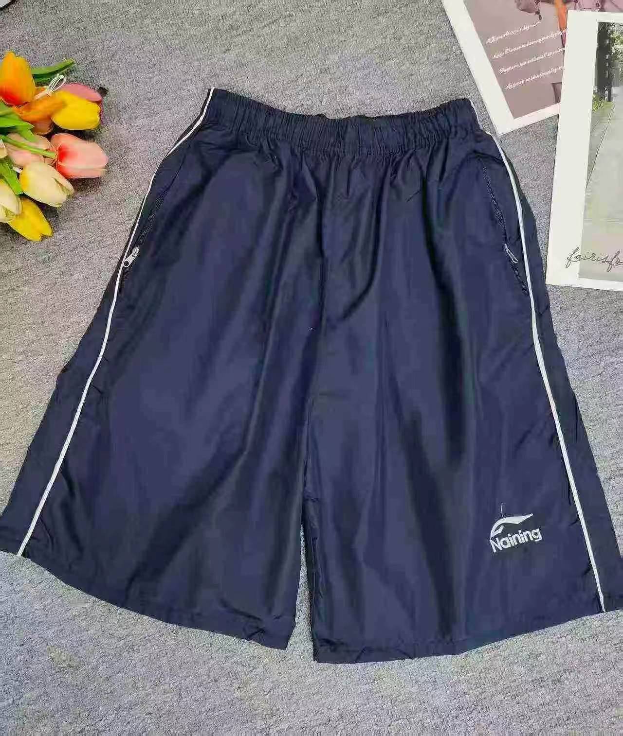 9999 Pcs Men's Quick Dry Loose Summer Beach Five-point Shorts One Size Individually Packed - Image 8