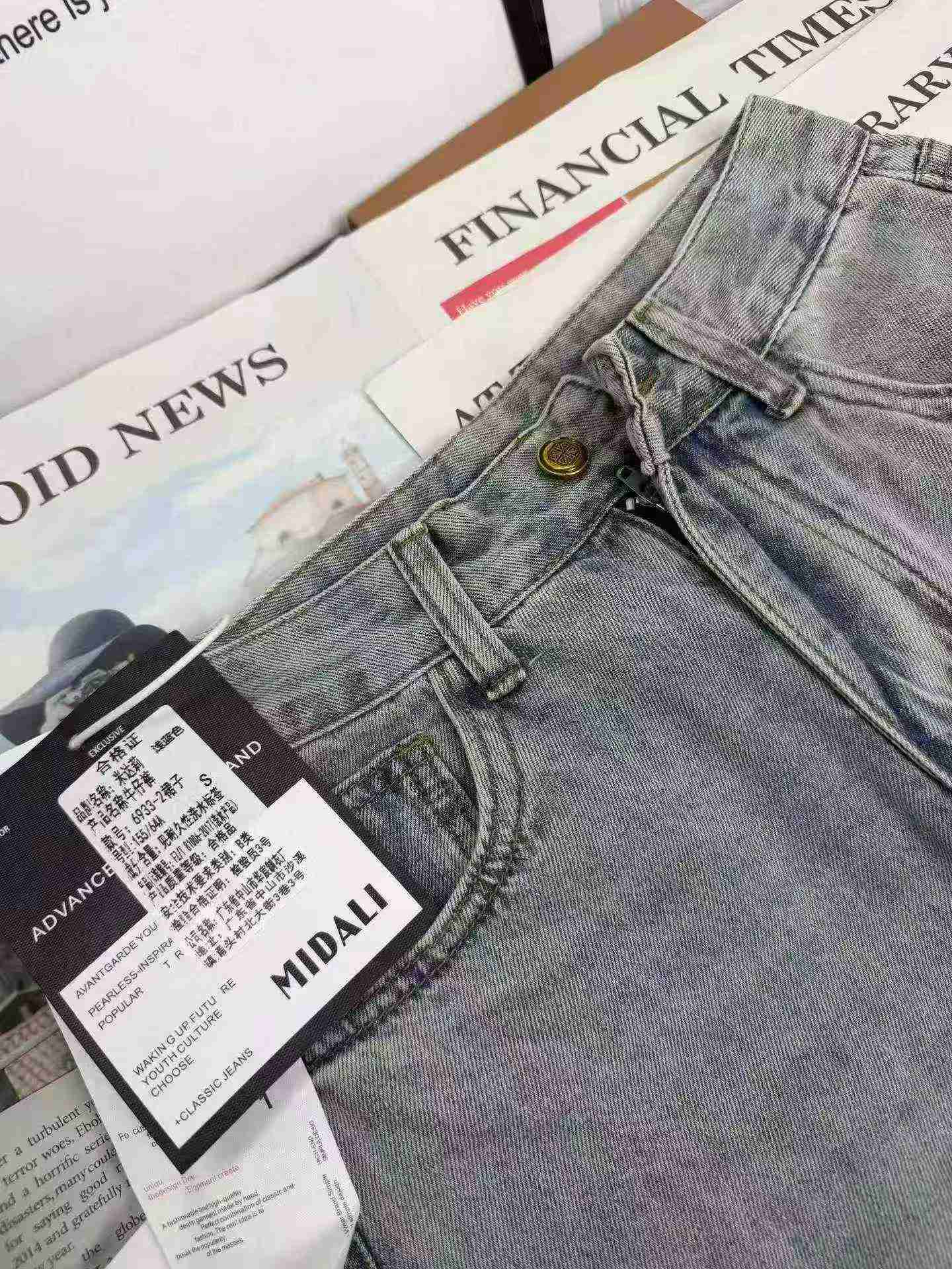 دامن جین کمر بلند مدل وینتیج با شکاف، تک طرح تک رنگ، 400 عدد، سایز از XS تا L، کد کالا 6933#610 - Image 6
