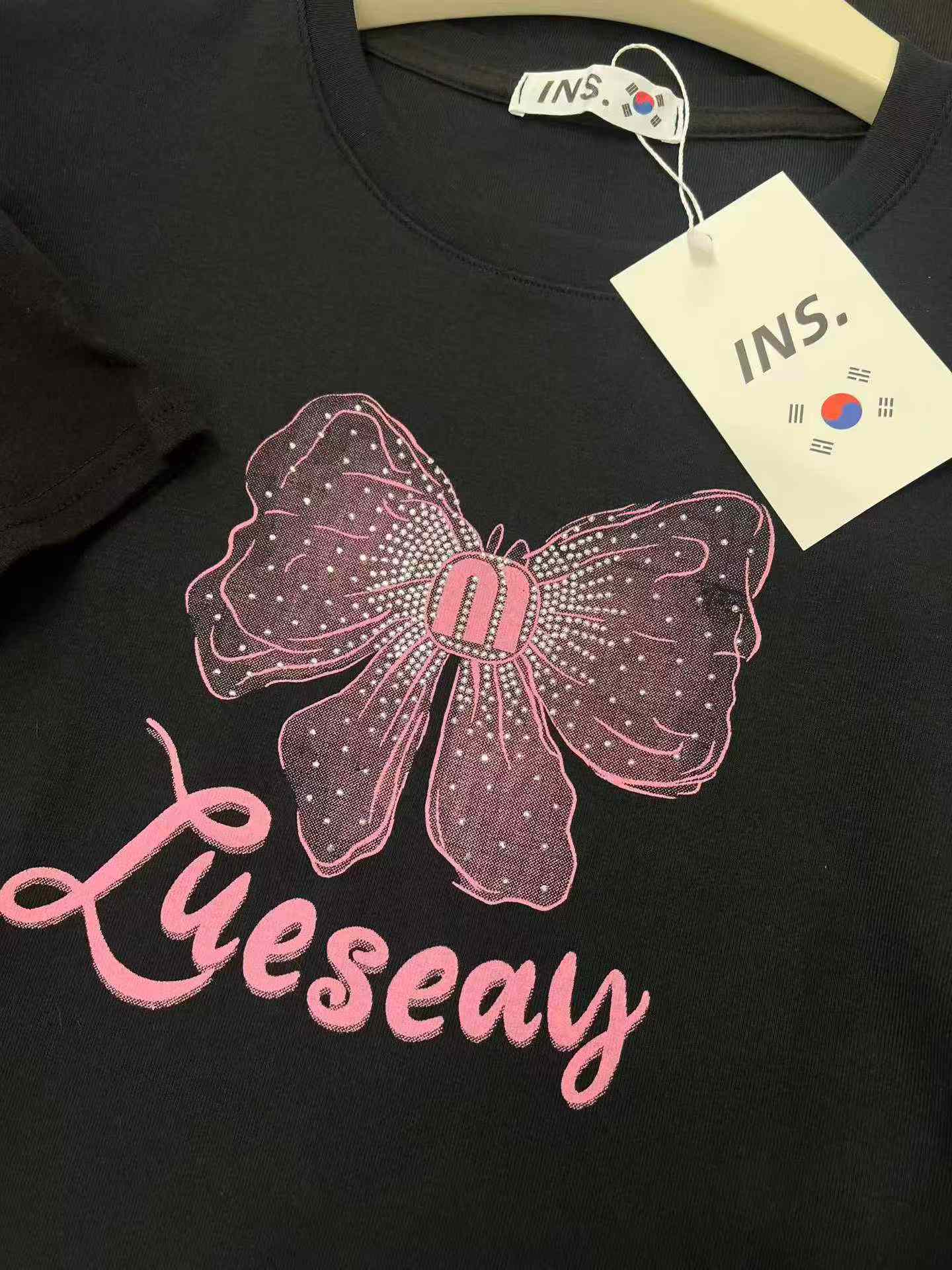 เสื้อยืดผู้หญิงแขนสั้นผ้าฝ้ายประดับลูกปัดคริสตัล สไตล์อเมริกันหวานแซ่บ จำนวน 2,000 ตัว - Image 6