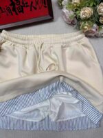 Wholesale Full Stock Lot: Lazy Style Apricot Fake Two-Piece A-Line Mini Skirts with Shorts - Single Style & Color, 50pcs, Individual Packaging - Image 3