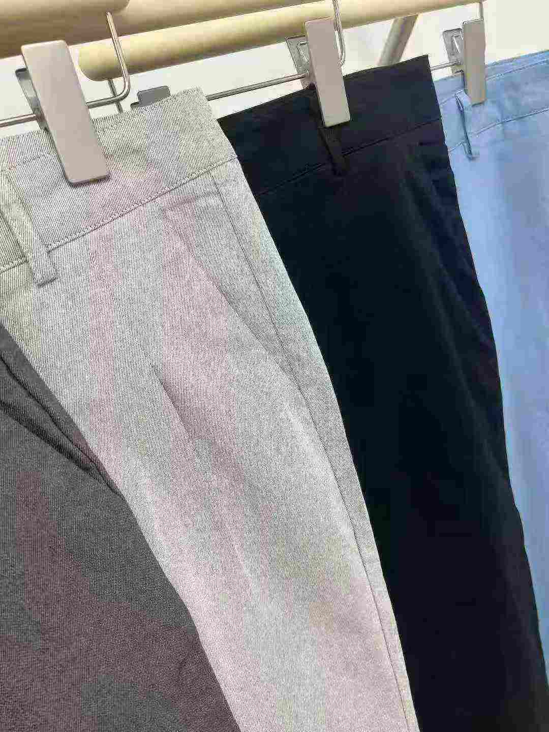 70 Pieces Plus Size Men's Casual Pants - Full Clearance 9.3 CNY Each | Sizes 32-40, White & Apricot Dominant, Individually Packed - Image 2