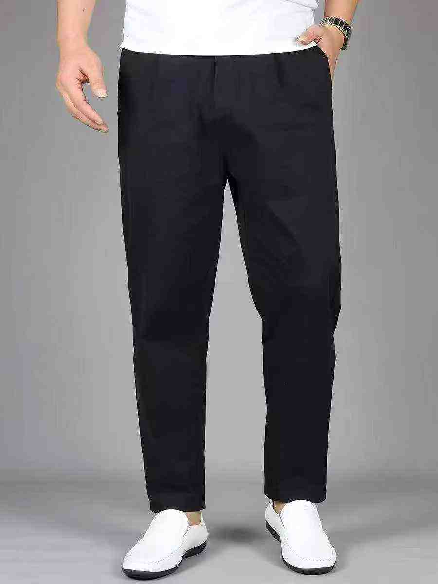 70 Pieces Plus Size Men's Casual Pants - Full Clearance 9.3 CNY Each | Sizes 32-40, White & Apricot Dominant, Individually Packed - Image 1