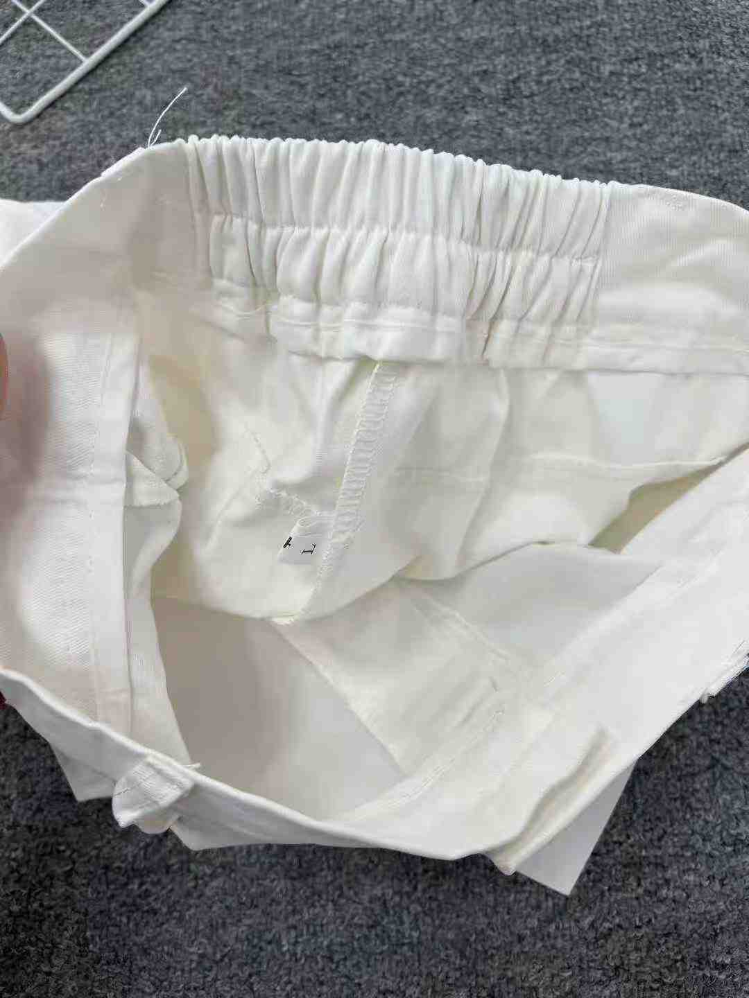 Bulk Clearance 130PCS High Waist Slimming White Denim Cargo A-line Mini Skirts For Wholesale Export - Image 2